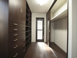 Interior Of A Narrow Hallway With A Shoe Rack