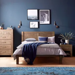 What color goes with blue in the bedroom interior