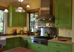 Dark green walls in the kitchen interior