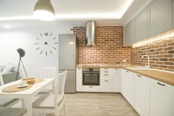 Kitchen design with bricks on the wall photo