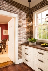 Kitchen Design With Bricks On The Wall Photo