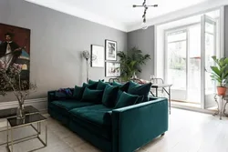 Gray green sofa in the living room interior