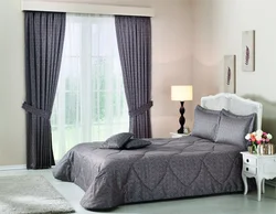 Bedroom curtains and bedspread in the same style photo