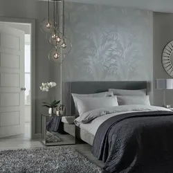 Light gray wallpaper in the bedroom interior