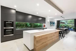 Island in the kitchen photo in a modern apartment