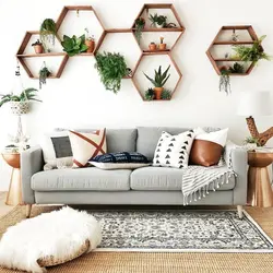 Decorating The Wall Above The Sofa In The Living Room With Your Own Photos