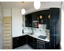 Photo of a kitchen with a ventilation duct in the corner photo