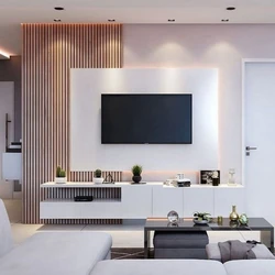 Living room interior with TV on the wall in a modern interior photo