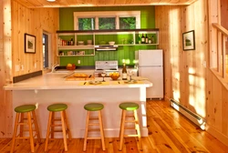 Kitchens On One Wall In A Wooden House Photo