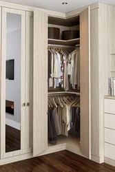 Corner wardrobe in the bedroom photo design ideas