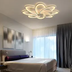 Design of spotlights on a suspended ceiling in the bedroom photo