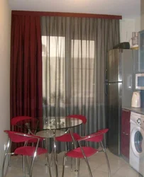 One curtain in the kitchen in the interior