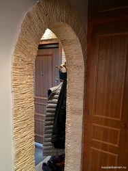 Stone arch in the apartment photo