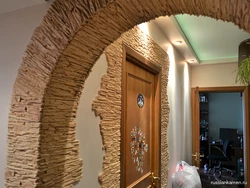 Stone arch in the apartment photo