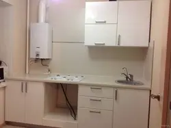 Kitchen design 6 meters with geyser and refrigerator