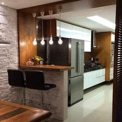 Kitchen Design In A House With A Window And A Bar Counter