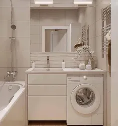 Small bathroom design with toilet and washing machine photo