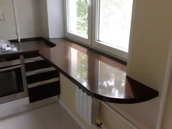 Countertop instead of a window sill in the kitchen photo