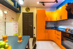 Color combination with orange in the kitchen interior photo