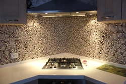 Mosaic as an apron in the kitchen photo