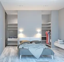 Дызайн гардэробнай у спальні з рассоўнымі дзвярыма
