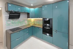 Light turquoise kitchen in the interior