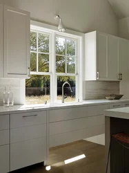 Kitchen With Sink By The Window In The House Interior