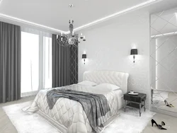 Серая спальня с белой мебелью фото