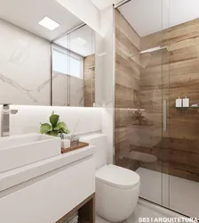 Bath Design With Marble Tiles And Wood