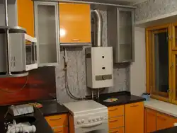 Kitchen design 6 sq m in Khrushchev with a gas water heater