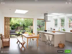 Kitchen design in a country house with access to the terrace