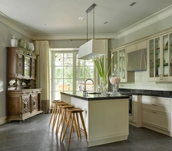 Kitchen design in a country house with access to the terrace