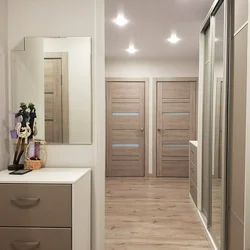 Light doors in the apartment interior real photos
