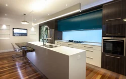 Photo of a kitchen with a TV set