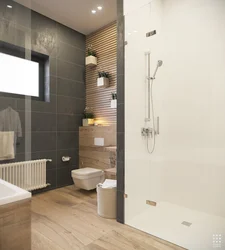 Gray bathroom with wood photo
