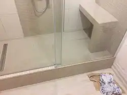 Bathroom with tile shower photo design