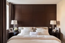 Modern bedroom interior with brown furniture
