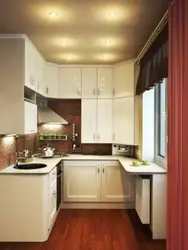 Corner small kitchen photo in apartment design