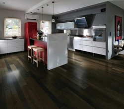 Kitchen photo with dark floor photo