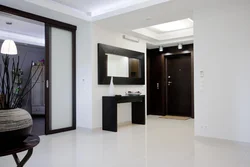 Living room design photo with dark doors