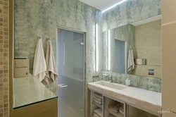 Finishing the bathtub with decorative plaster photo