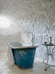 Finishing The Bathtub With Decorative Plaster Photo