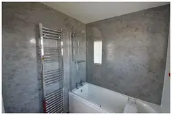 Finishing The Bathtub With Decorative Plaster Photo