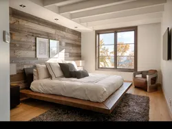 Bedroom in a log house photo