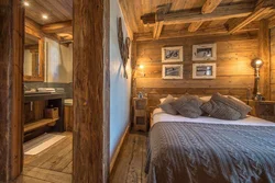 Bedroom in a log house photo