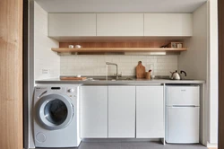 Built-In Washing Machine In The Kitchen Photo