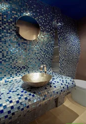 Mosaic on the wall in the bath photo