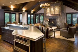 Kitchen design living room with fireplace in the house photo