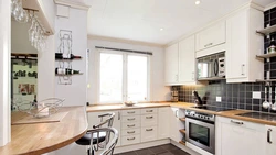 Bright corner kitchens with window photo