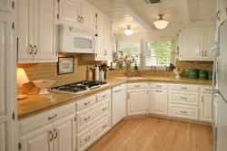 Bright corner kitchens with window photo